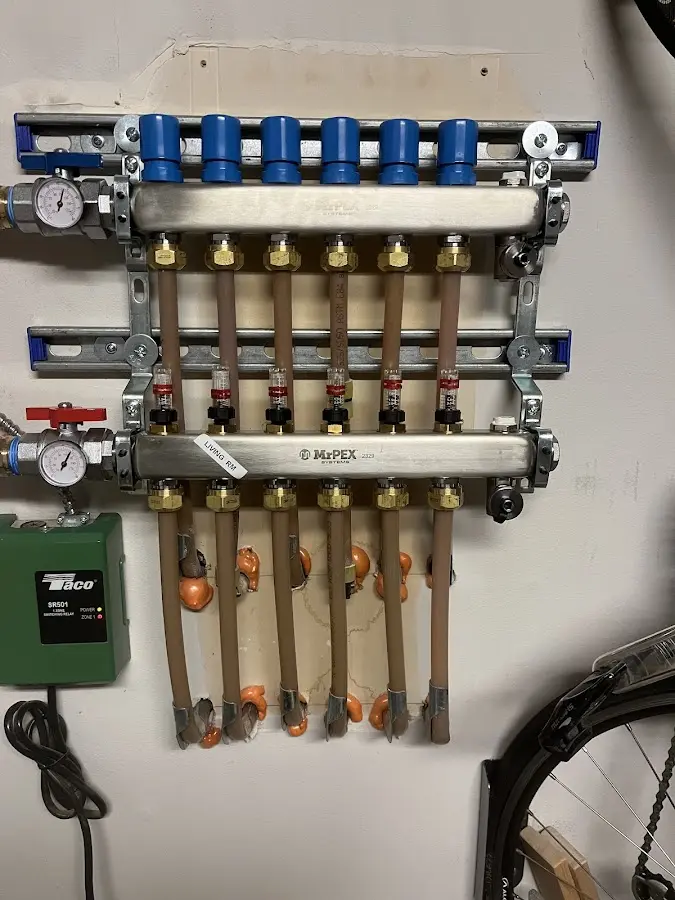 Plumber performing Gas Leak Detection at a residential property in Babylon